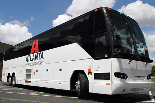 a plain white charter bus with an 